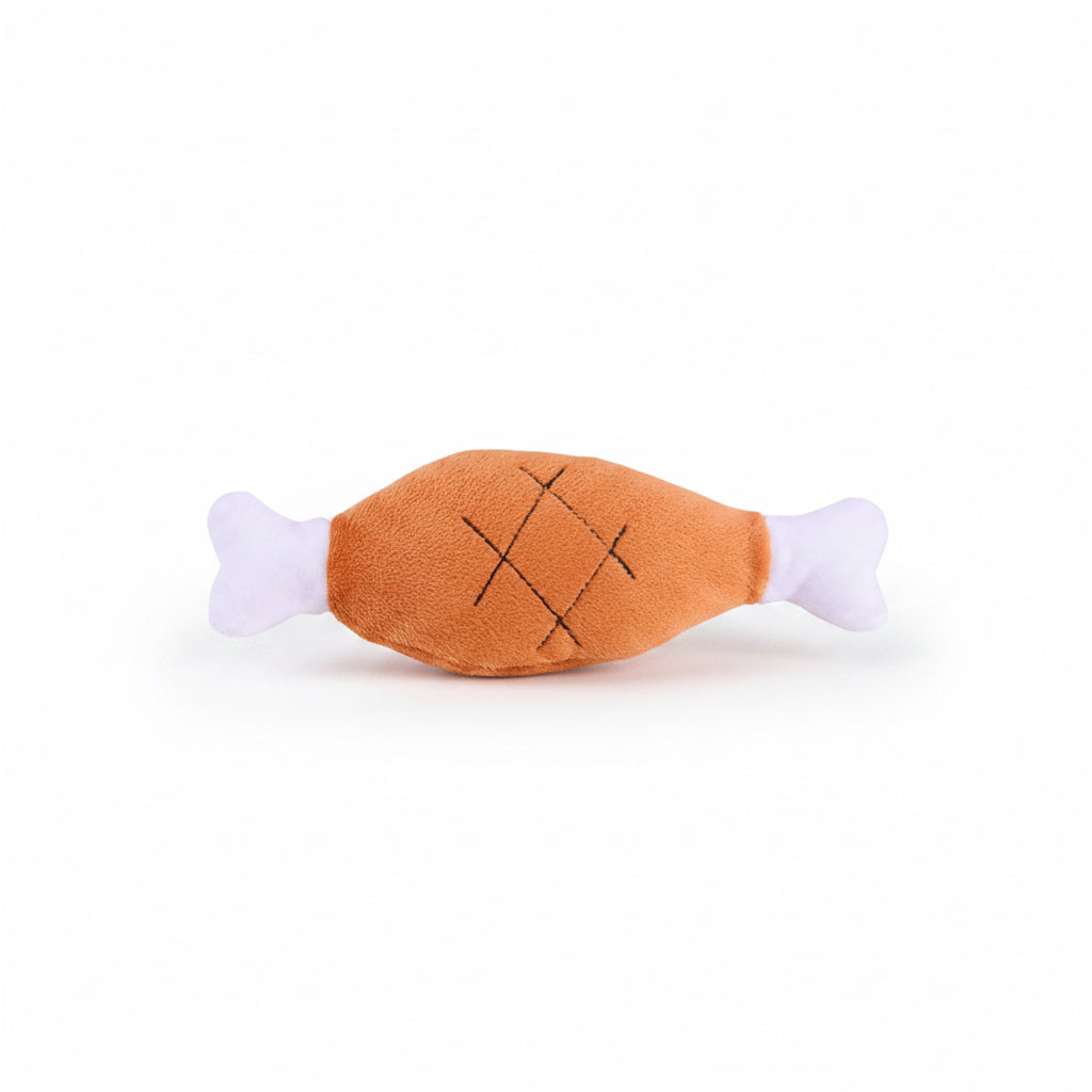 Jouet peluche cuisse poulet couineur intégré